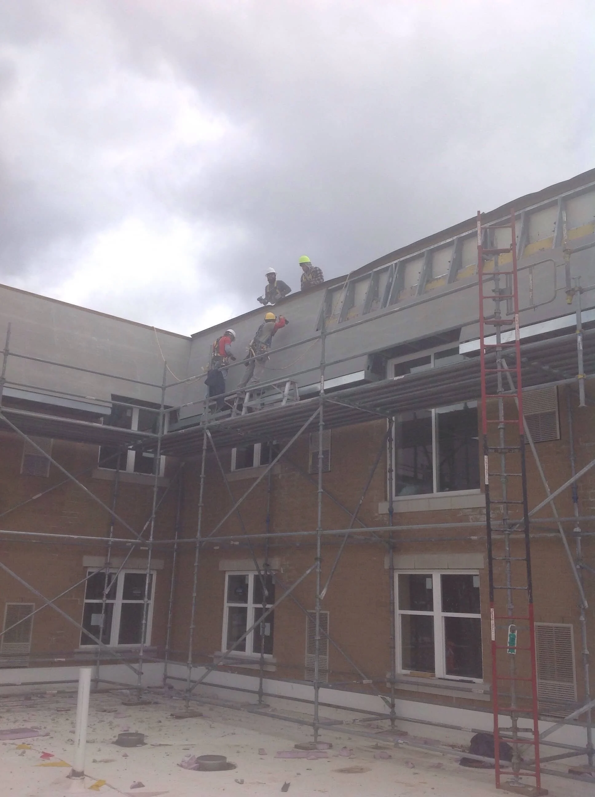 Exterior multi-family framing — Aspired Living development