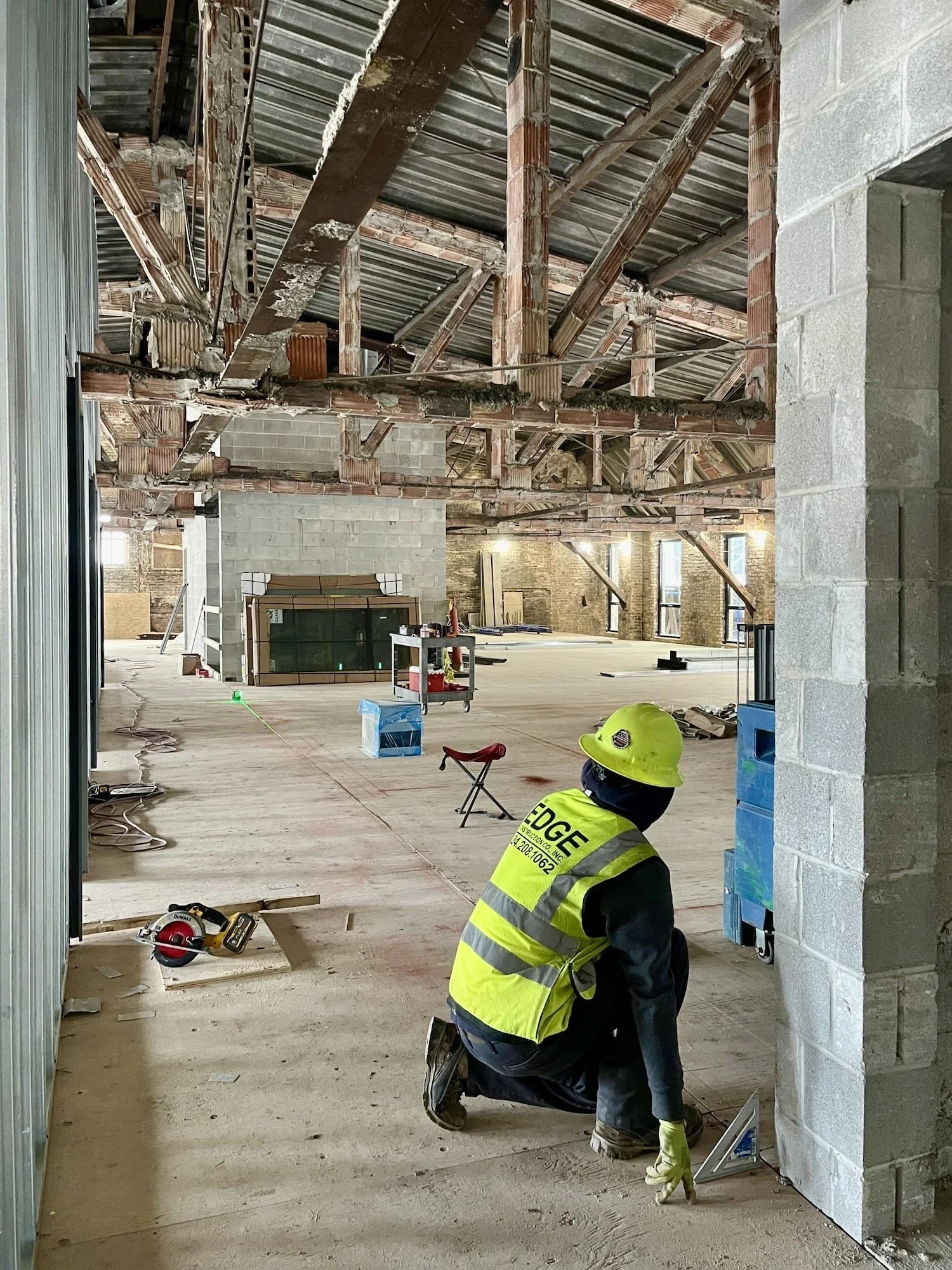Wall framing with original brick exposed — Varsity Theater